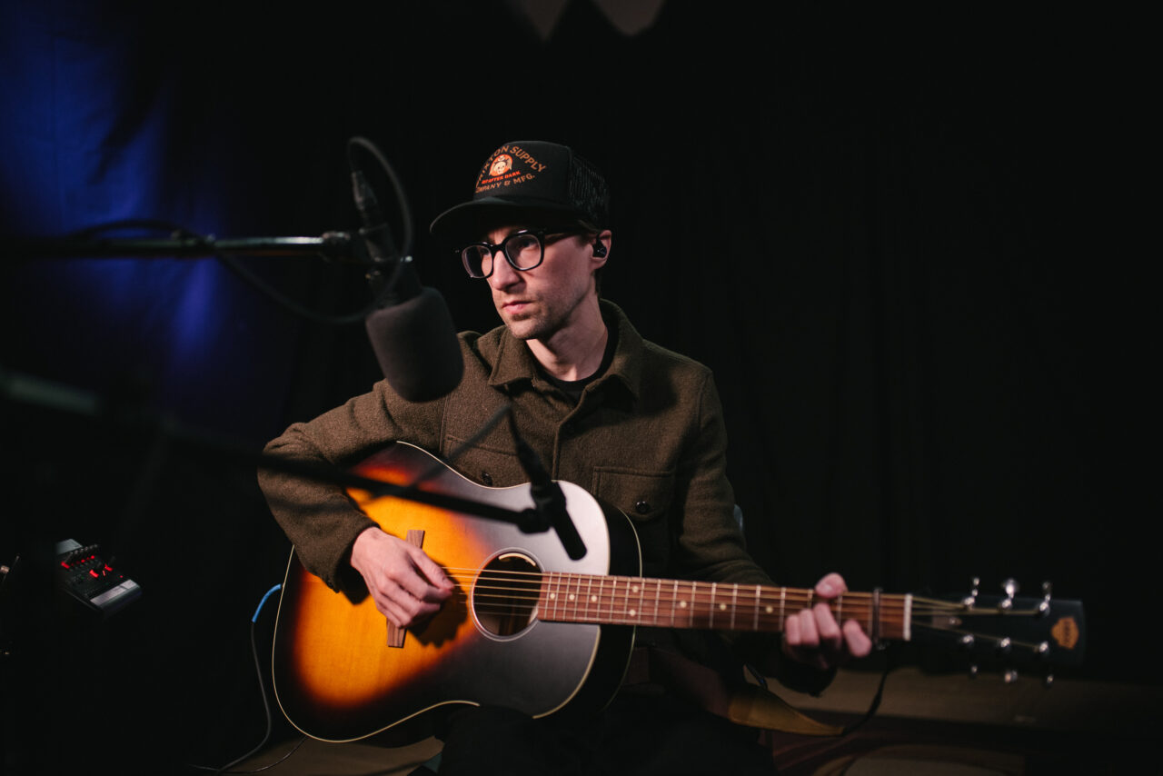 Roland Lewis performing in the studio.