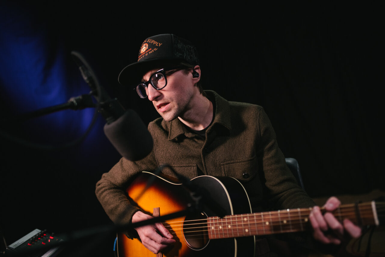 Roland Lewis performing in the studio.