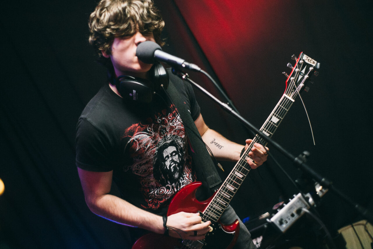 A singer and guitarist performing