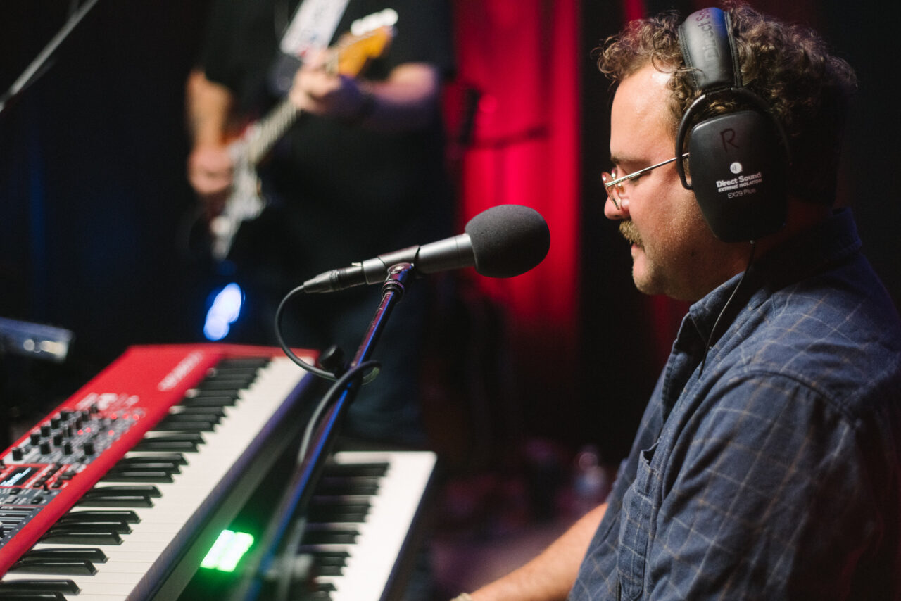 Zach Nyce playing keyboard.