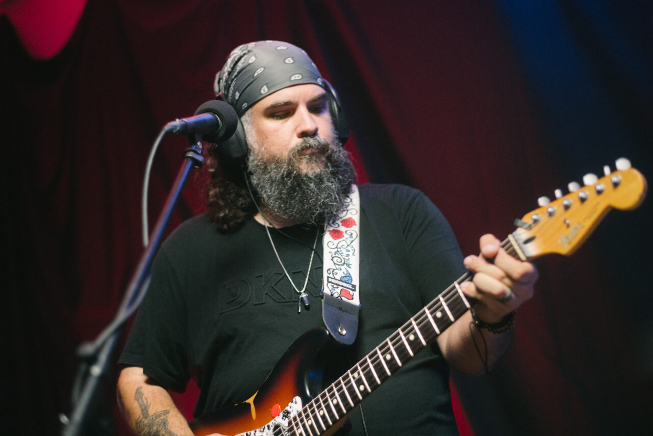 Colin Alvarez playing guitar.