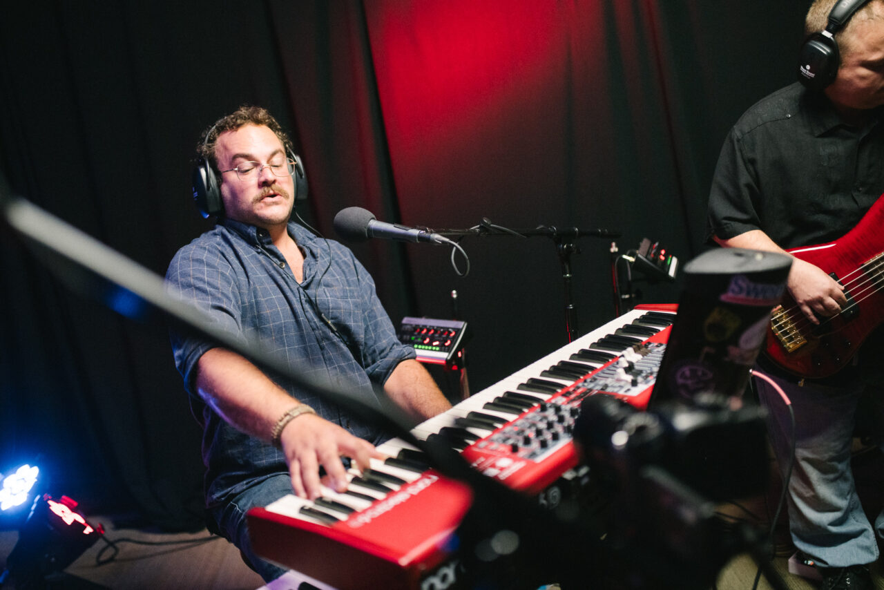 Zach Nyce playing keyboard.