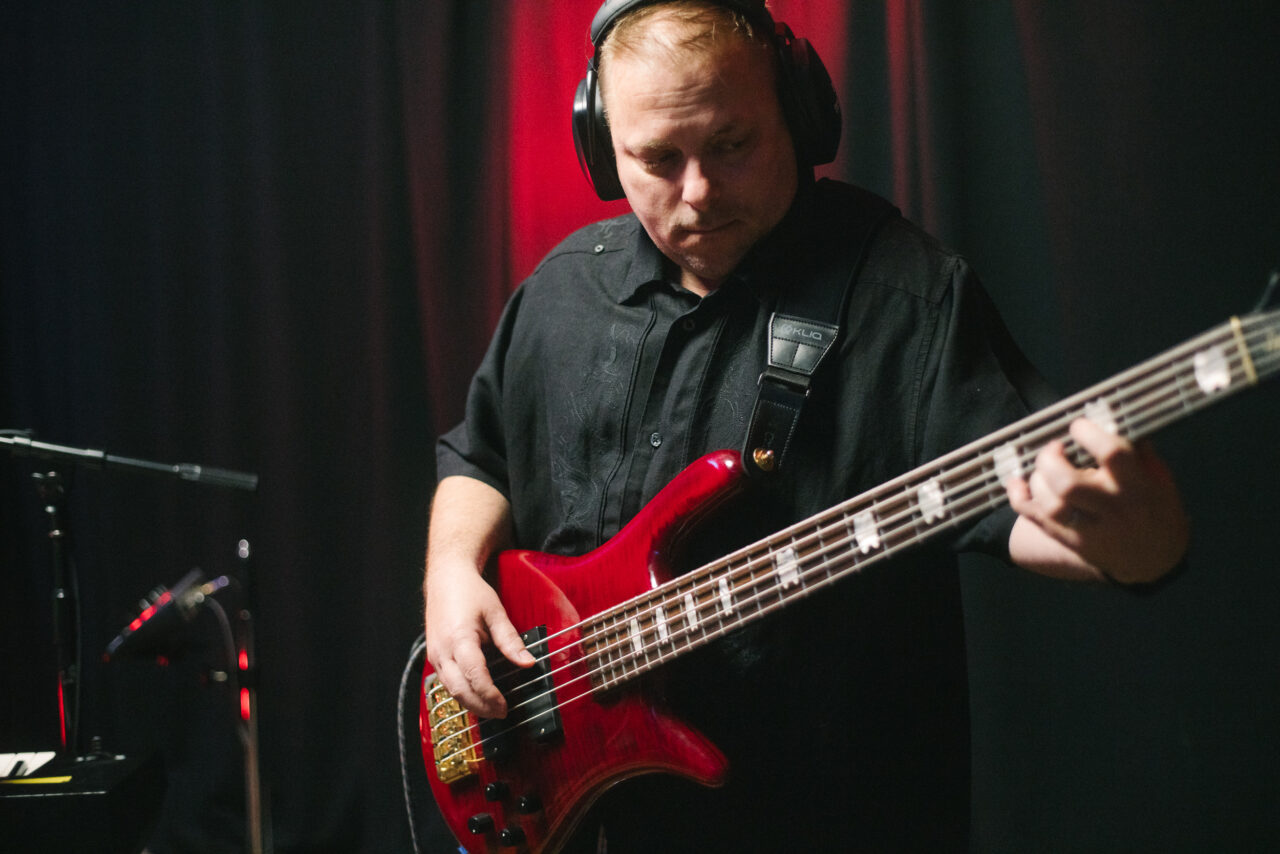 Drew Hall playing bass.