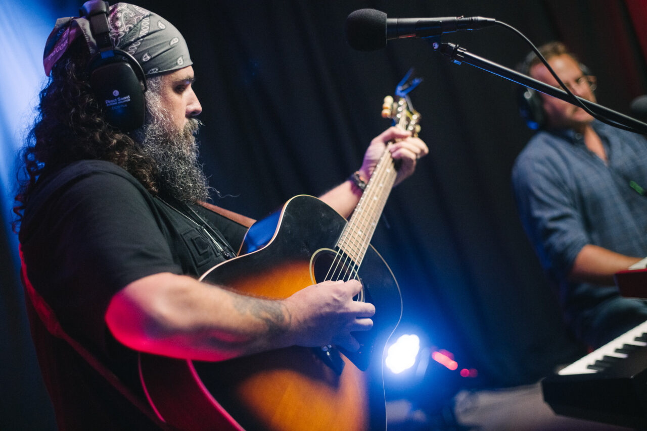 Colin Alvarez playing guitar.