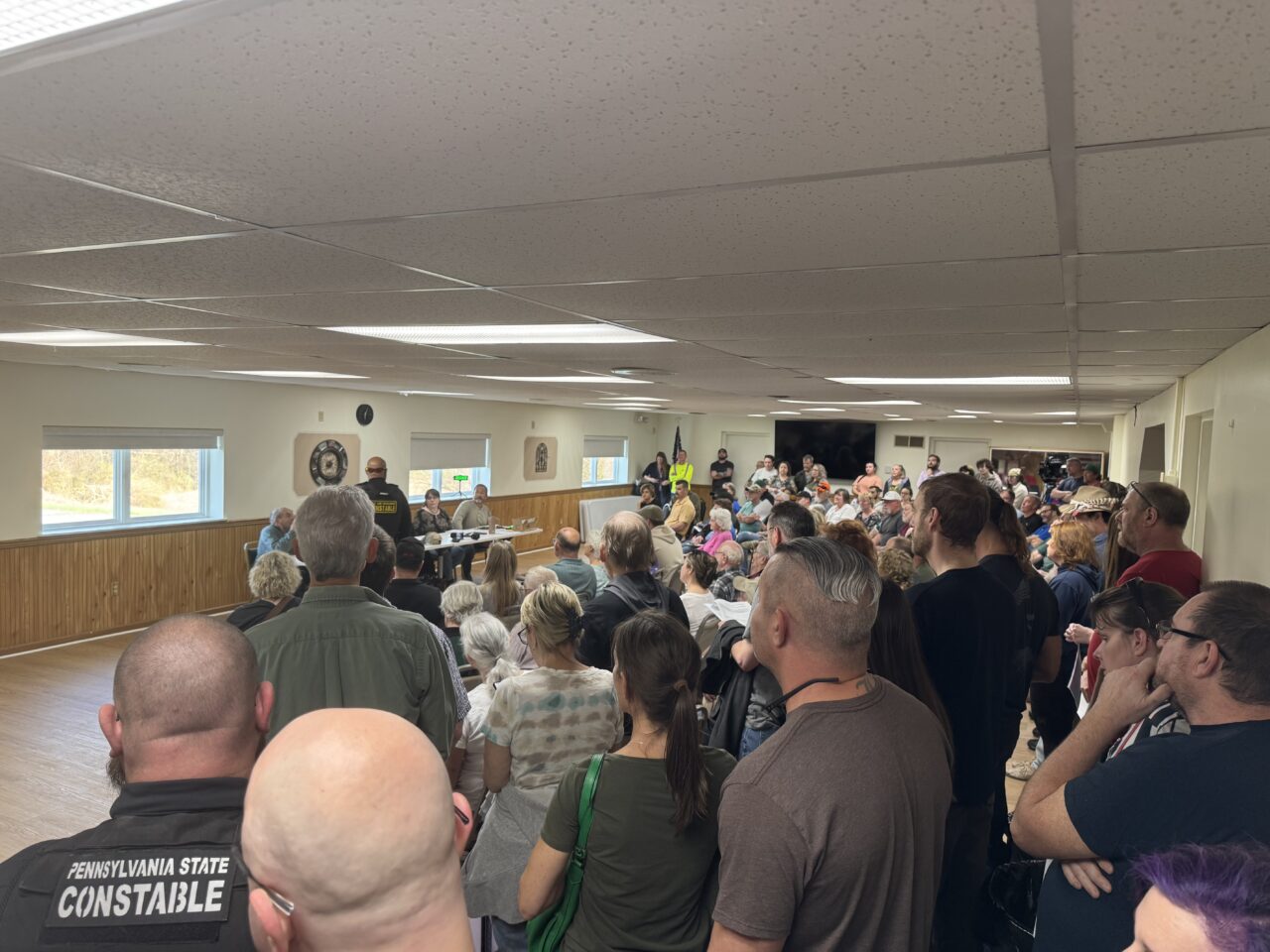 Too many people showed up to the Watts-Buffalo Community Center for the township supervisors meeting, causing it to be moved outside on April 1, 2026.
