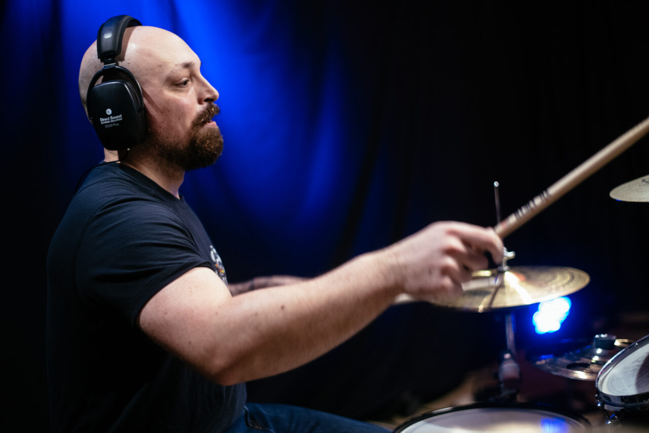 Drummer in Making A Mockery playing drums.