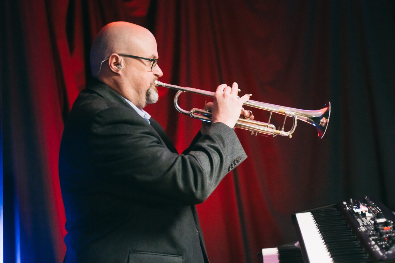 A man playing trumpet.