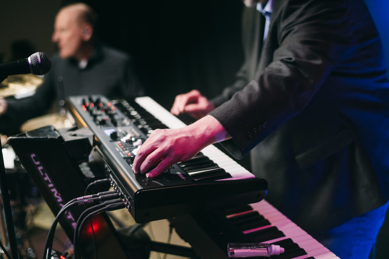 Hands on an electronic keyboard