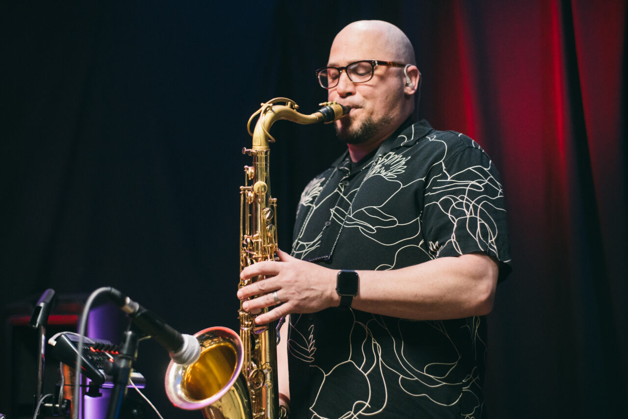 A man playing saxophone