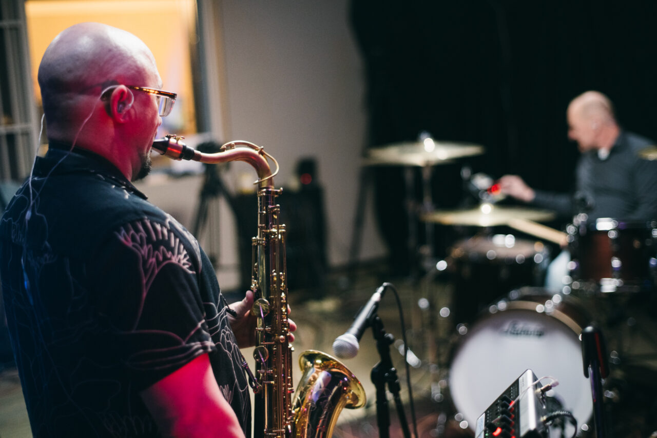 Man playing a saxophone.