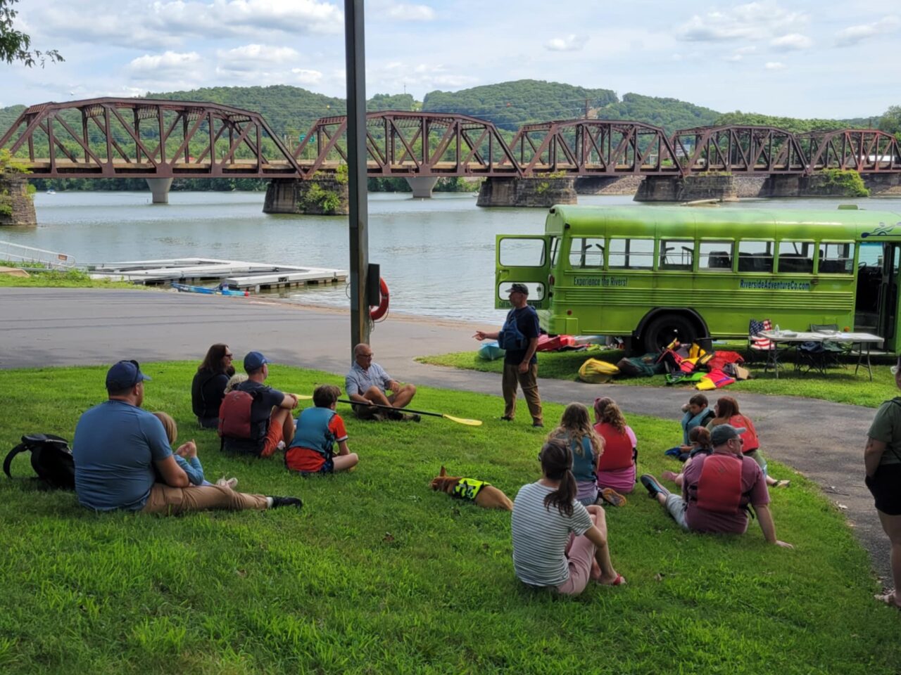 A group talks after kayaking.