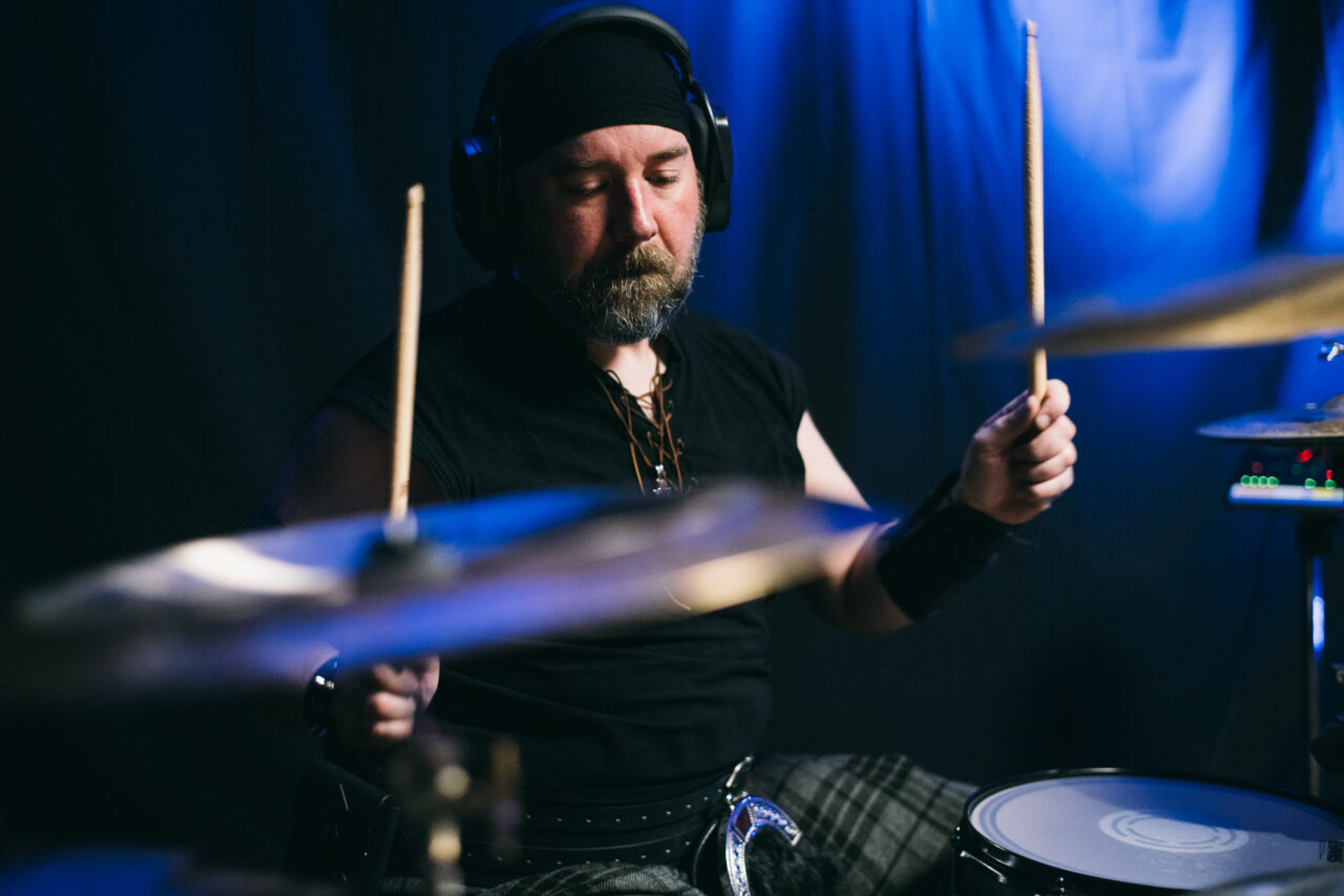 A person playing drums