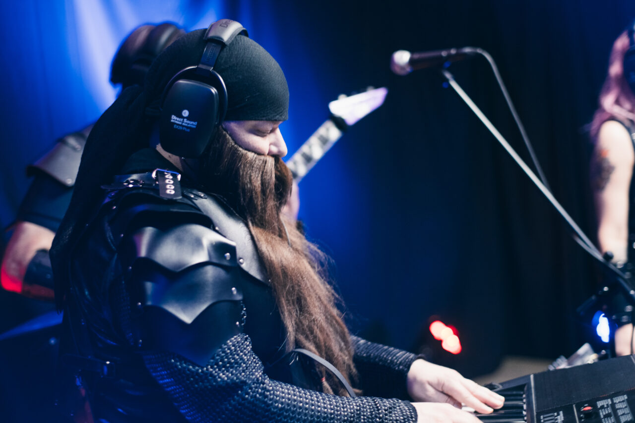 A man playing keyboards.