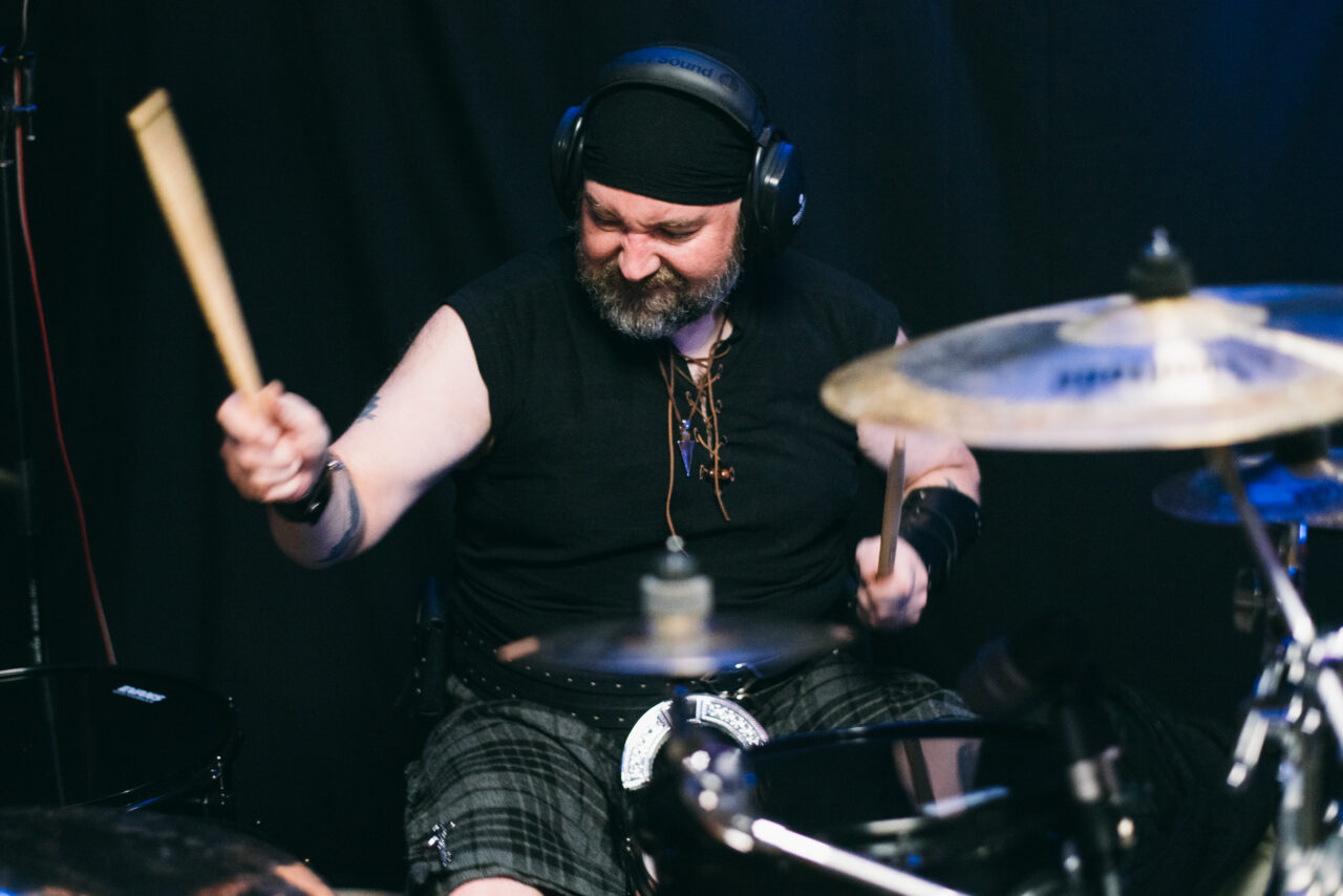 A person playing drums