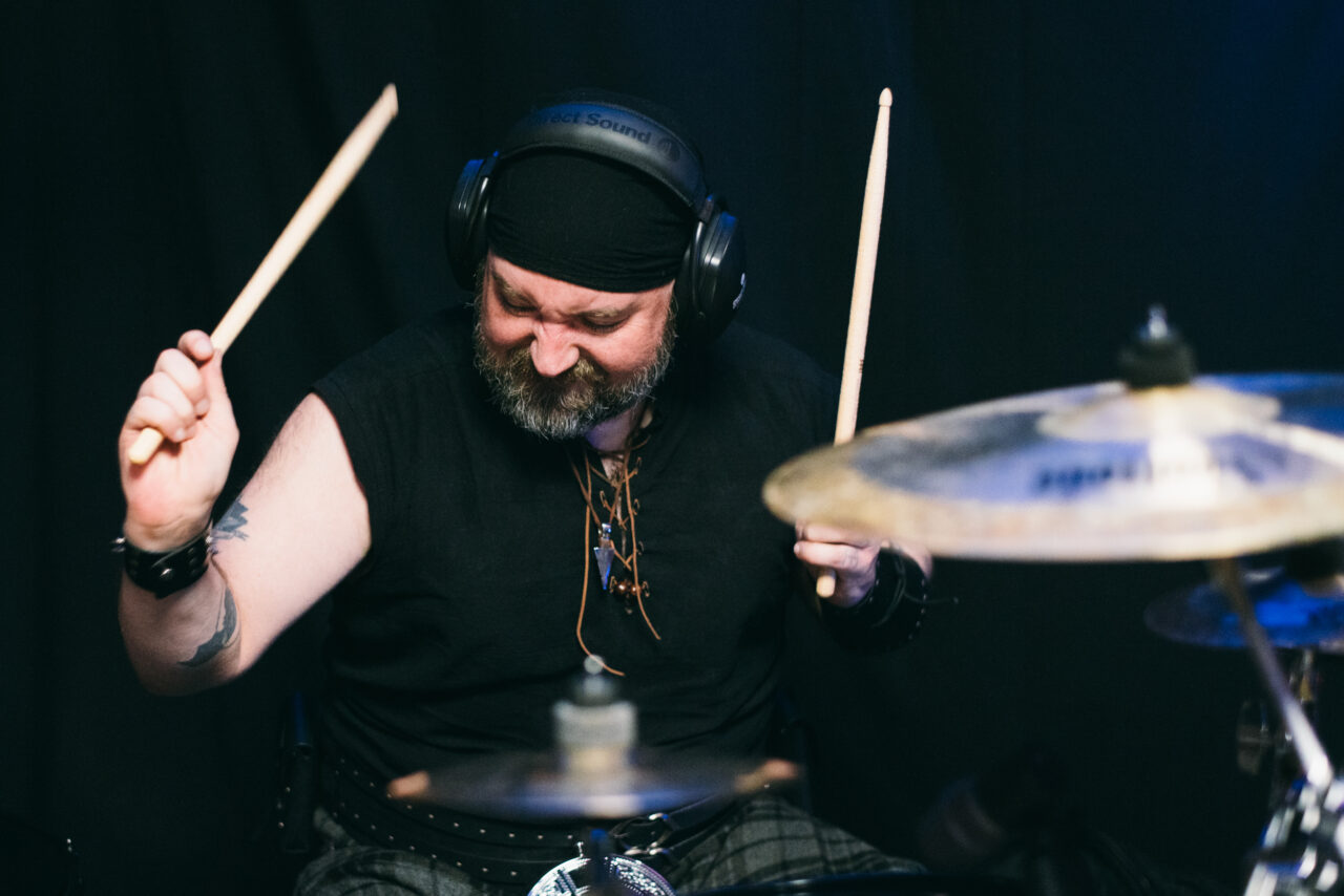 A person playing drums