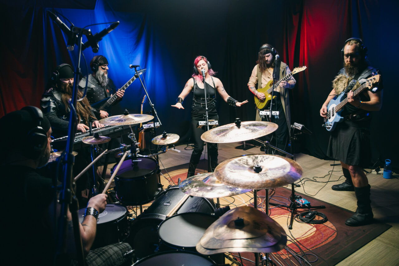 A band playing in a small room.